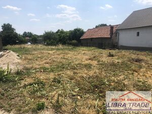Predaj - stavebný pozemok na výstavbu rodinného domu s projektovou dokumentáciou v Čalovci — foto 1